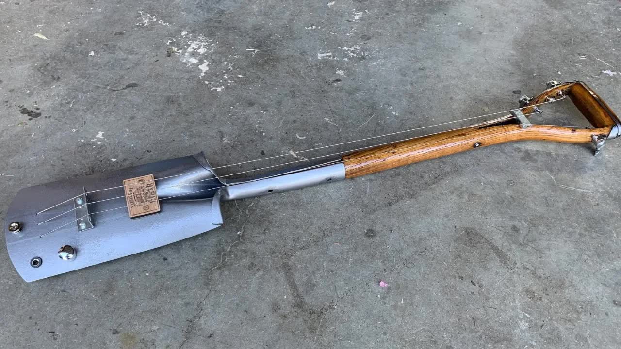 I Built a Guitar Out of an Old Shovel.jpg