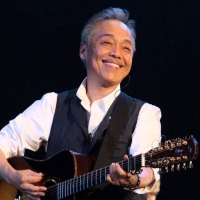 谷村新司
